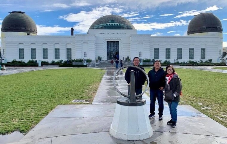 Family enjoying views at Griffith Observatory during a Guideline Tours Los Angeles tou