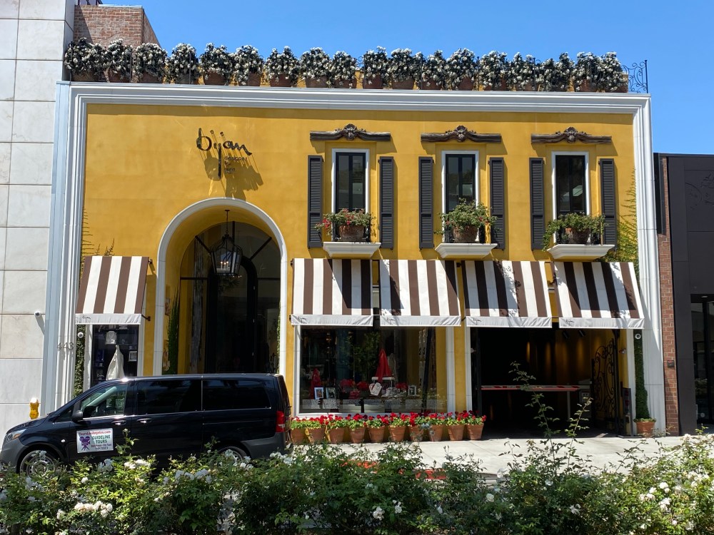 Guideline Tours Mercedes parked on Rodeo Drive outside the Bijan store in Beverly Hills
