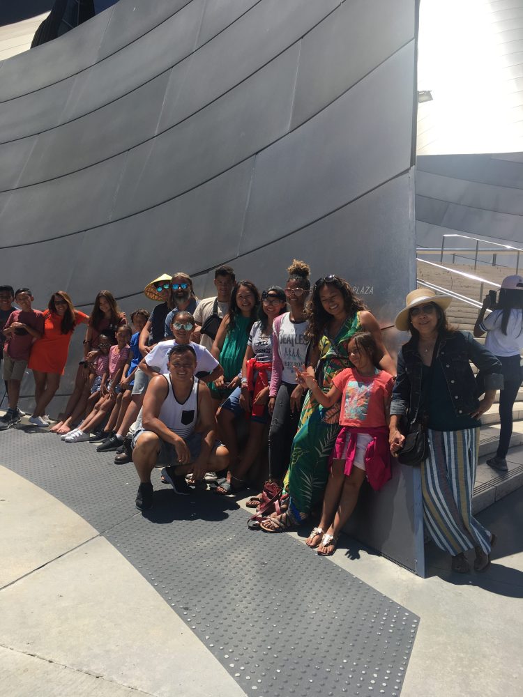 Los Angeles tour packages group photo at Walt Disney concert hall-Hollywood bus Tours by Guideline Tours