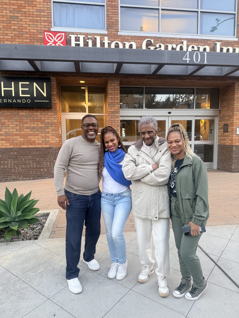 Smiling family returning to Hilton Garden Inn Burbank after a private Los Angeles, Hollywood and Beverly Hills tour.
