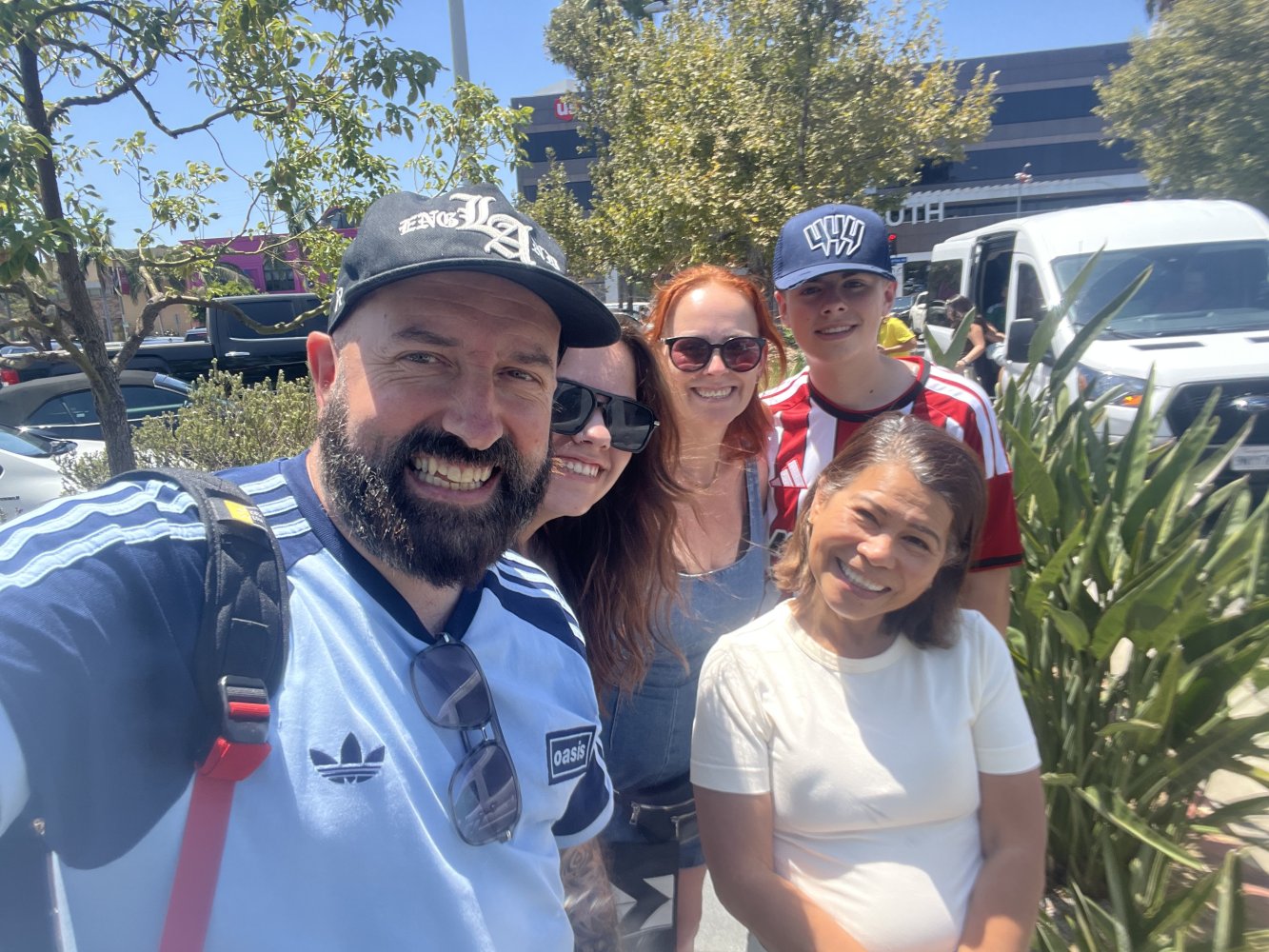 Guideline Tours guide Bing with group at Original Farmers Market in Los Angeles